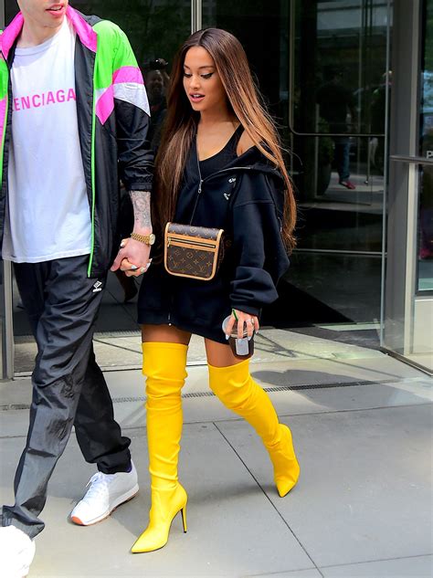 Ariana Grande Wearing Thigh High Boots.